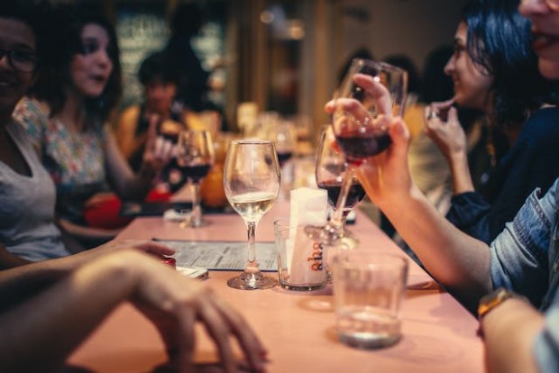 People drinking wine in a restaurant