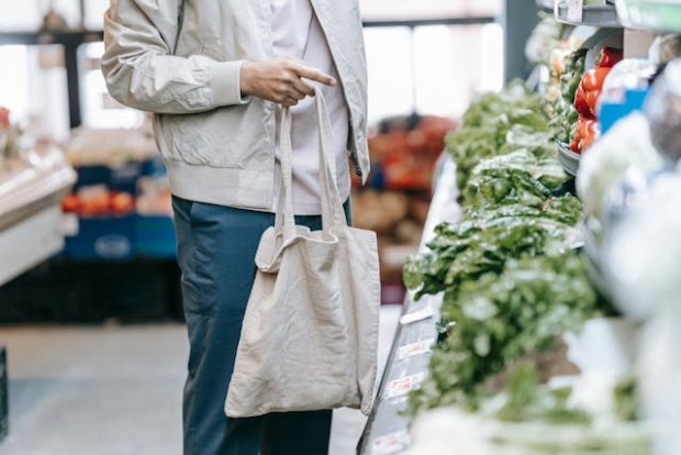 Customer carrying white bag