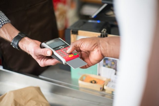 A person paying at the counter