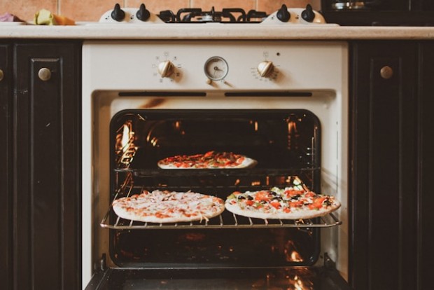 Baked pizza in an oven