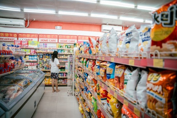 Woman standing in a supermarket