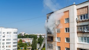 fire on the balcony of a multi-storey building