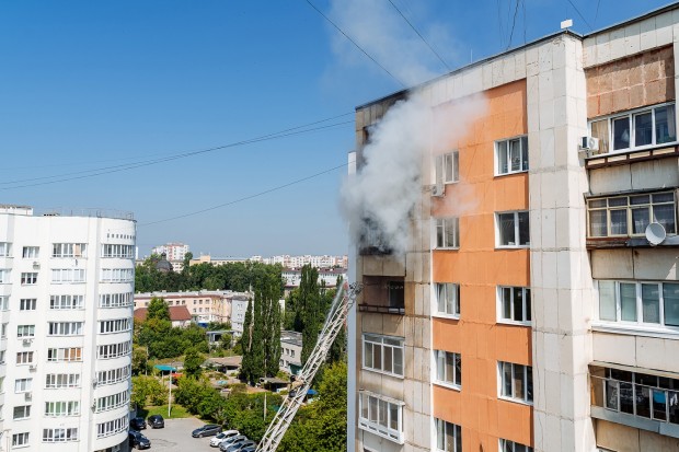 fire on the balcony of a multi-storey building