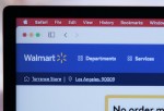 A laptop with a Walmart logo on it