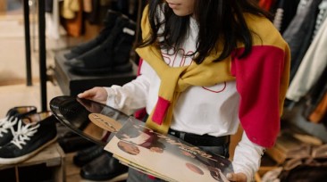Woman looking at a vinyl record