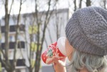 A woman drinking starbucks coffee