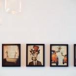 Four paintings on wall