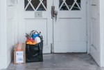 Groceries beside a door